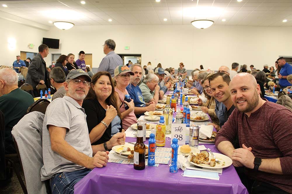 Guests at a dinner table at Bingo Night
